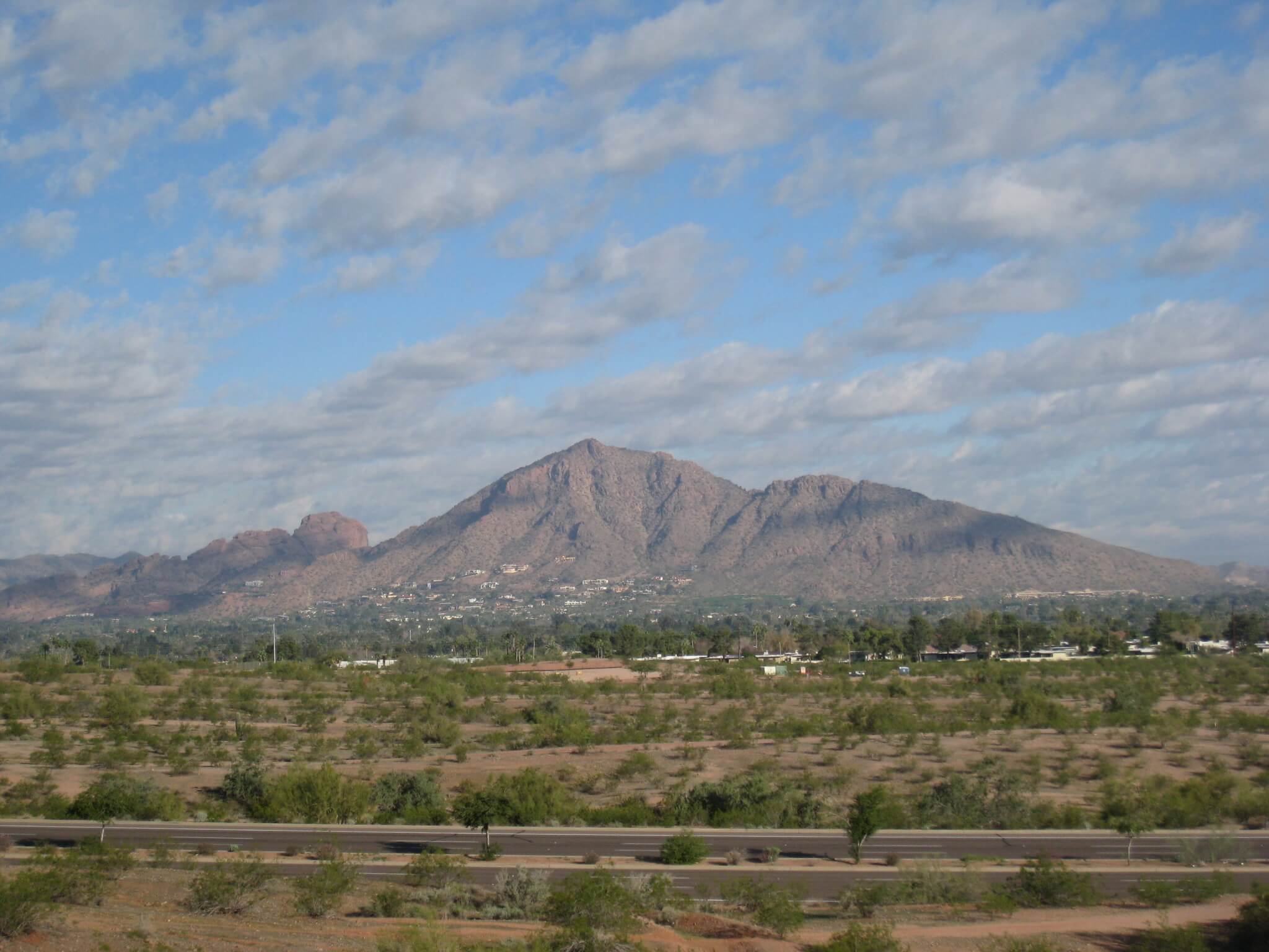 A profile picture of Camelback Mountain in the midday sun.